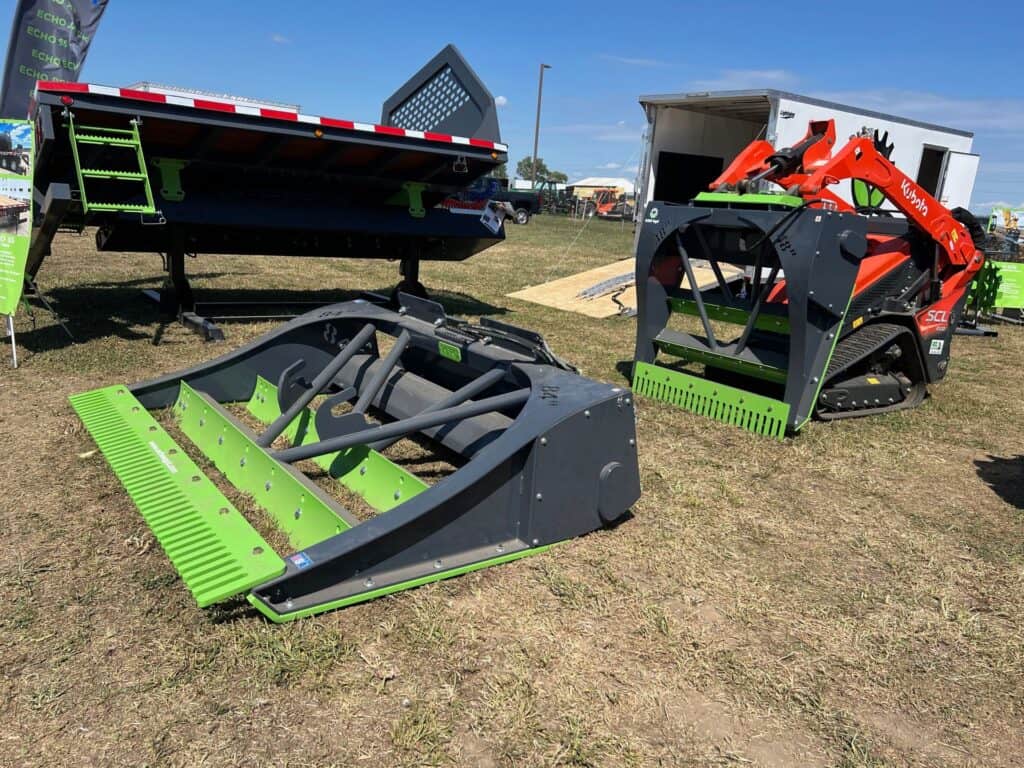 ECHO PG3 skid steer power grader attachment displayed with skid steer loader