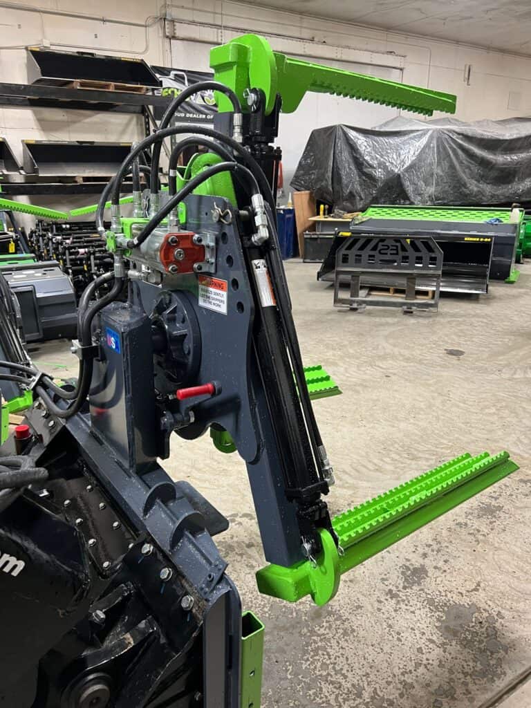 ECHO Handler X3 skid steer attachment used to lift and install oversized tractor tires