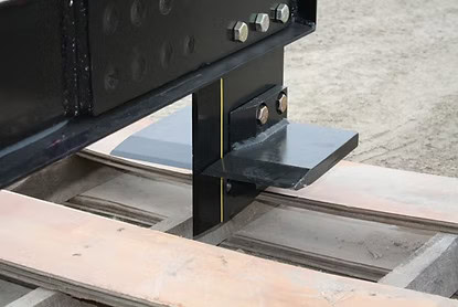 Close up of four way wedge on M&M Hydra Split skid steer log splitter attachment