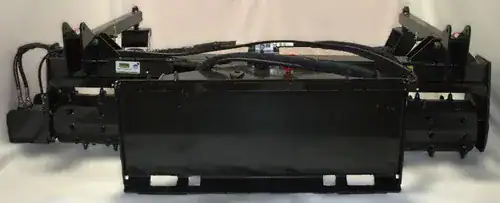Prime Attachments skid steer soil conditioner rear view showing mounting plate and hydraulic connections for skid steers