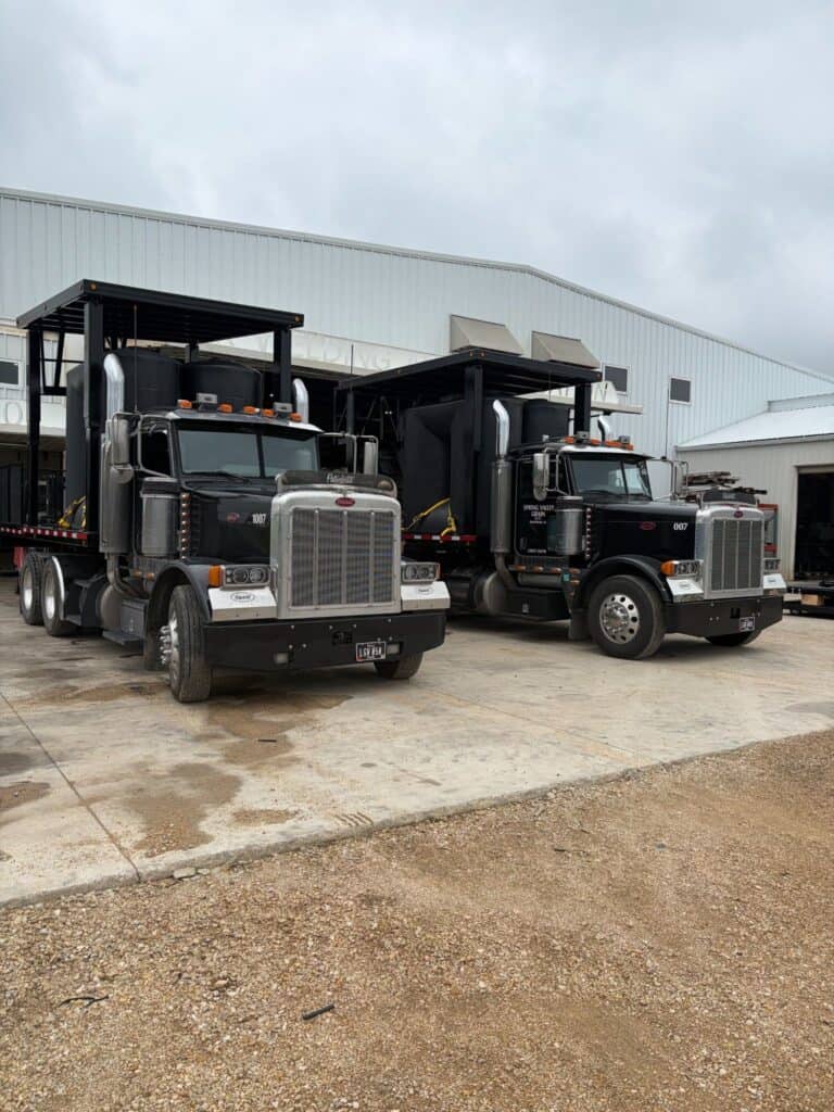 SS Heli Skid agricultural helicopter platform mounted on dual semi truck setup