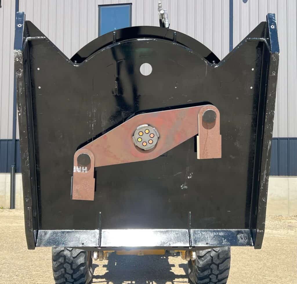 Bottom blade carrier assembly on Stinger Twister F2 skid steer brush cutter