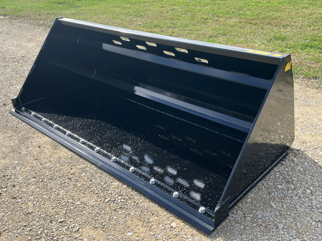 Front right side view of Stinger SNB skid steer snow bucket showing deep shell, cutting edge, and reinforced side plate