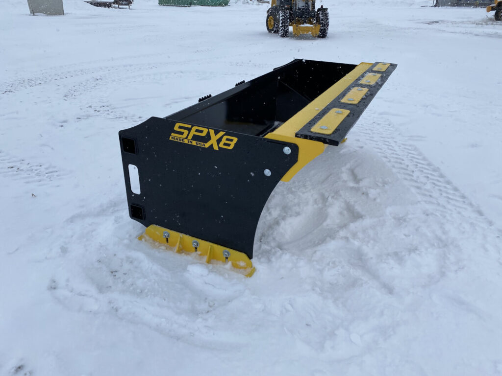 Stinger SPX8 snow pusher rear view showing quick attach mounting structure and upper snow edge