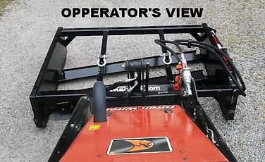 Skid-Max 3X mini skid steer dirt and gravel grader operator view showing blade system and grading controls from cab