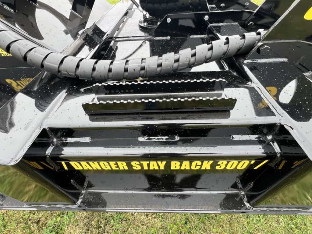 Stinger Twister F3 brush cutter operator step with safety warning decal
