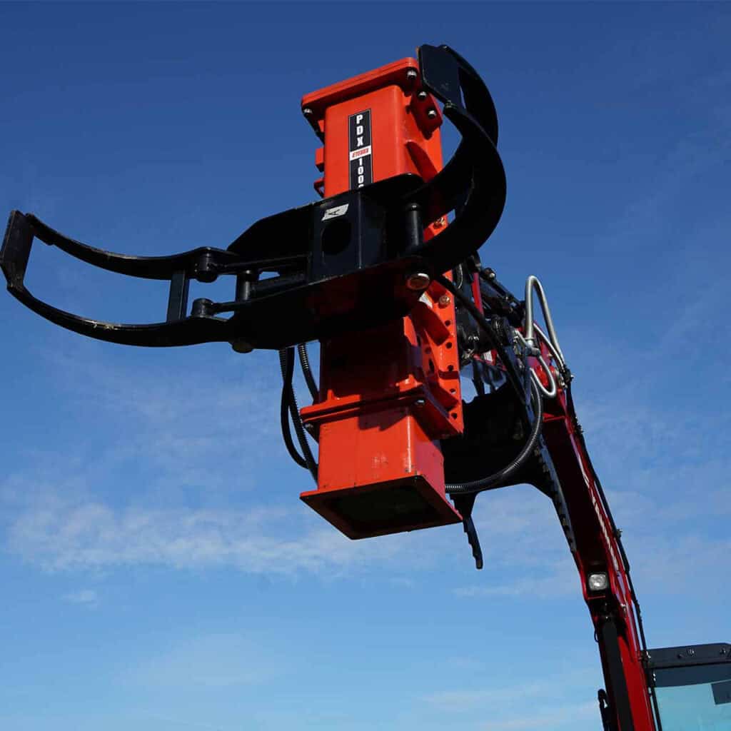 Eterra PDX-1000 excavator post driver with post-grabbing attachment viewed from below