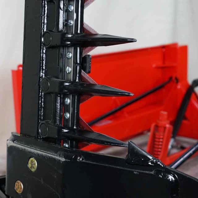 Close-up of the cutting teeth and sickle sections on the Eterra skid steer sickle bar mower