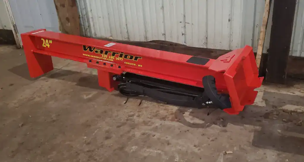 TM Warrior Mini Skid Steer Splitter in warehouse.