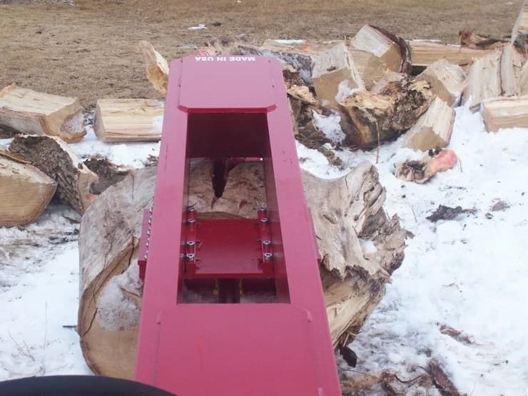 Operator view of the TM Manufacturing Pro 1 fixed wedge positioned over a large log round