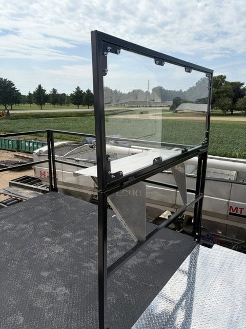 Side view of the ECHO SS Drone Dock clear shield mounted on the upper trailer work platform