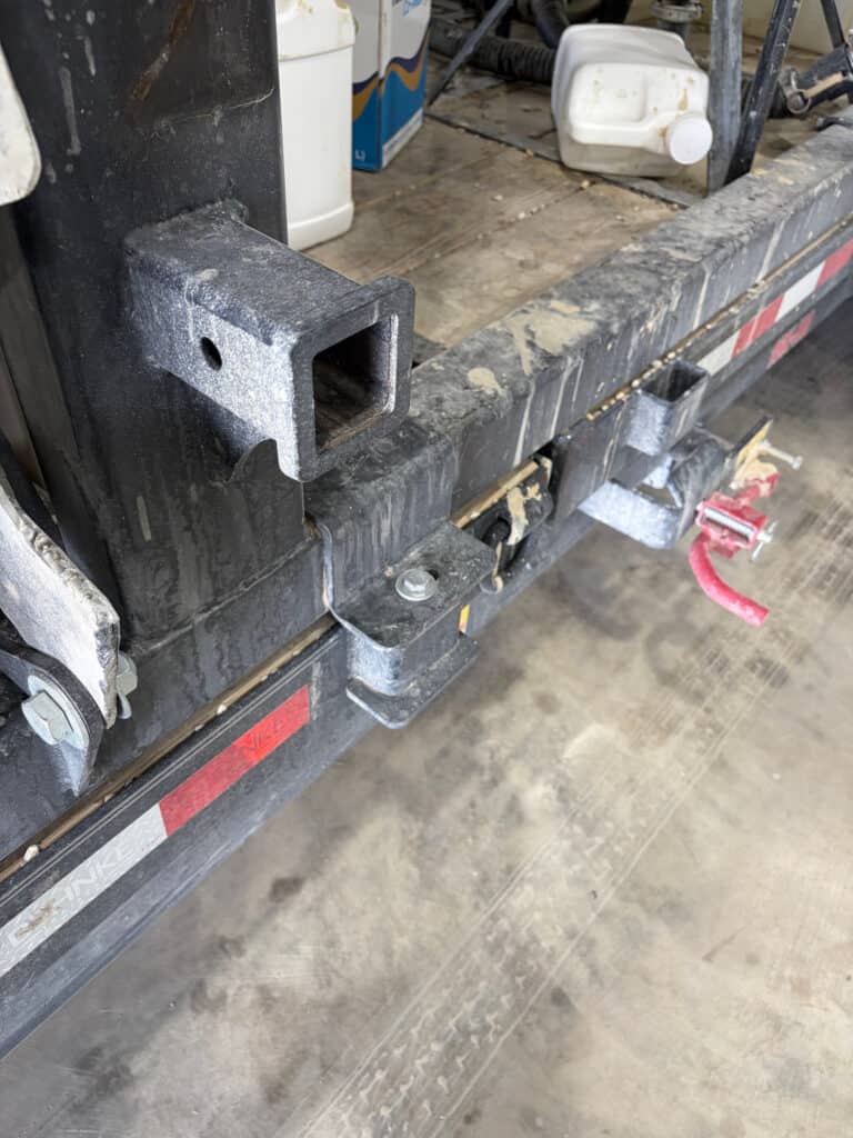 Close-up of the ECHO SS Drone Dock removable trailer platform mounting receiver and heavy steel frame connection