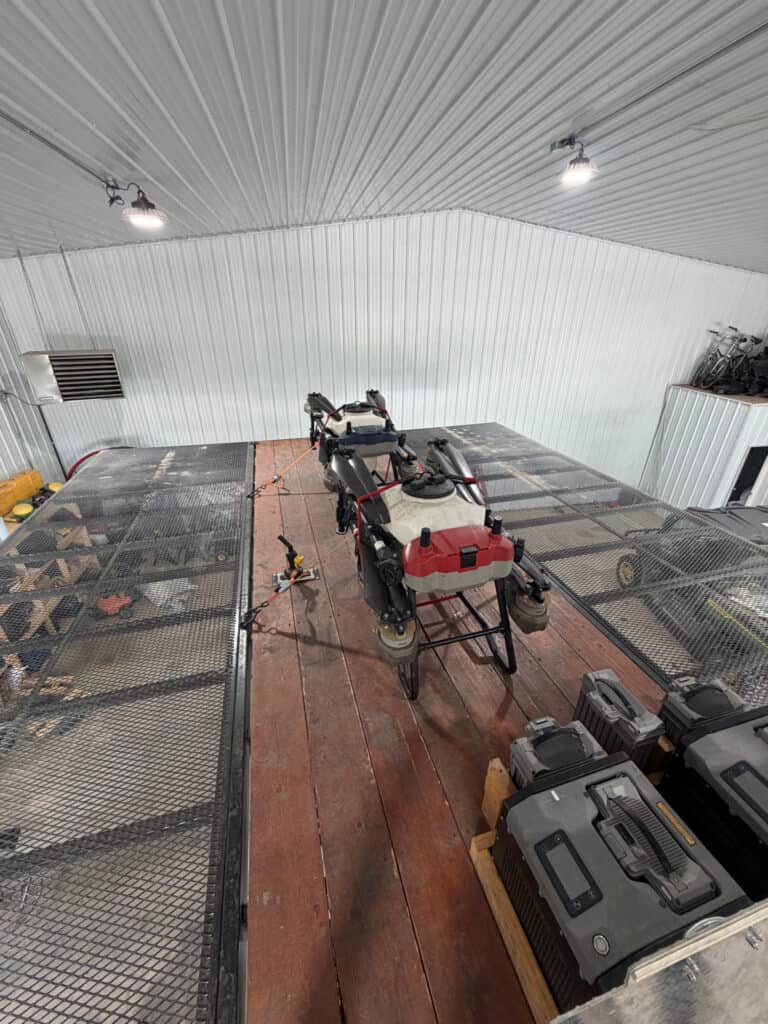 Top view of the ECHO SS Drone Dock removable trailer platform showing the expanded work deck and drone equipment
