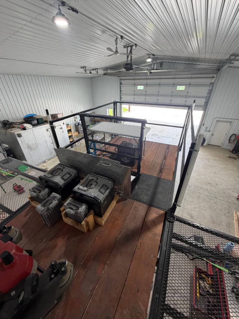 Upper deck of the ECHO SS Drone Dock showing the wood work platform, equipment area, mesh gate and safety rails