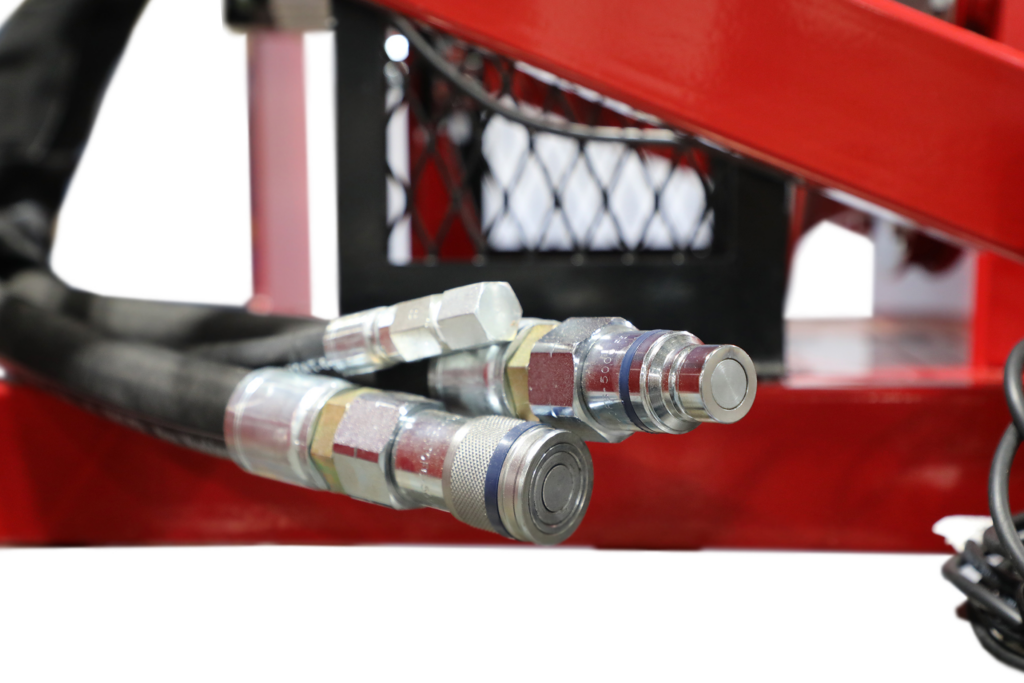 Close-up of the flat face quick connect hydraulic couplers included with the Buffalo Turbine Cyclone Hydraulic skid steer debris blower