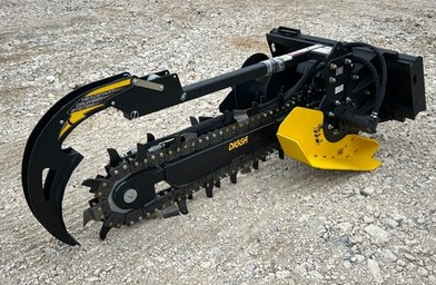 Digga Bigfoot 900 skid steer trencher with cutting chain, depth-control foot, and spoil auger