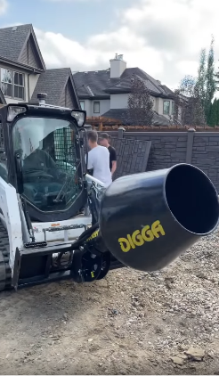 Digga cement mixer attachment mounted on a Bobcat skid steer