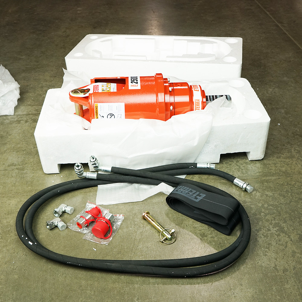 Eterra excavator auger drive kit with hydraulic hoses, couplers, mounting pin, and protective sleeve