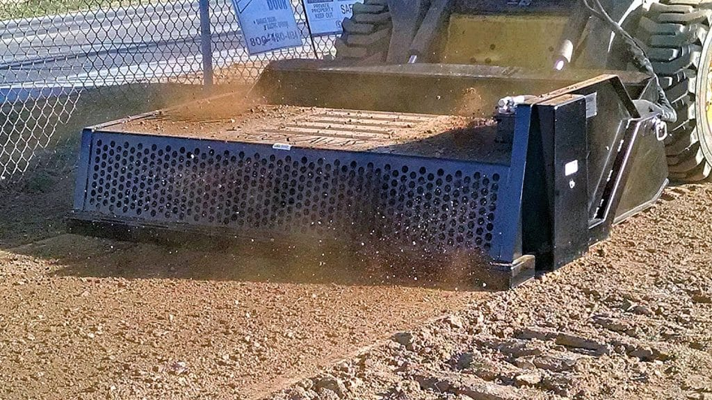 Ideal Rockaway 7415 skid steer rock rake removing rocks while conditioning soil
