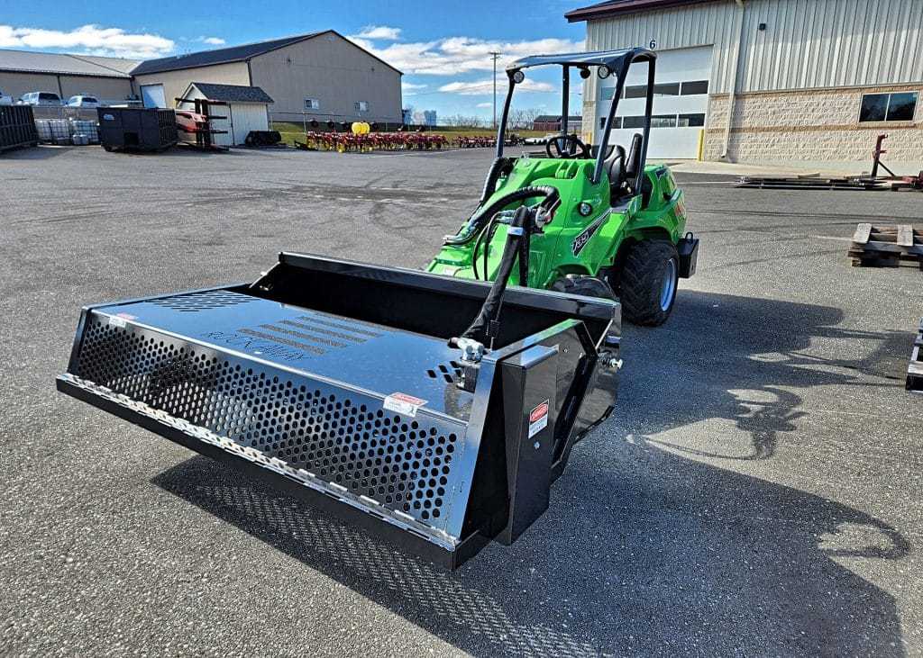 Ideal Rockaway 8415 landscape rock rake mounted on an Avant loader