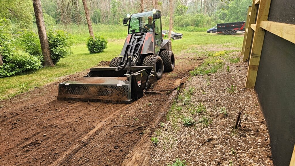 Ideal Rockaway 8415 skid steer rock rake removing rocks and conditioning soil