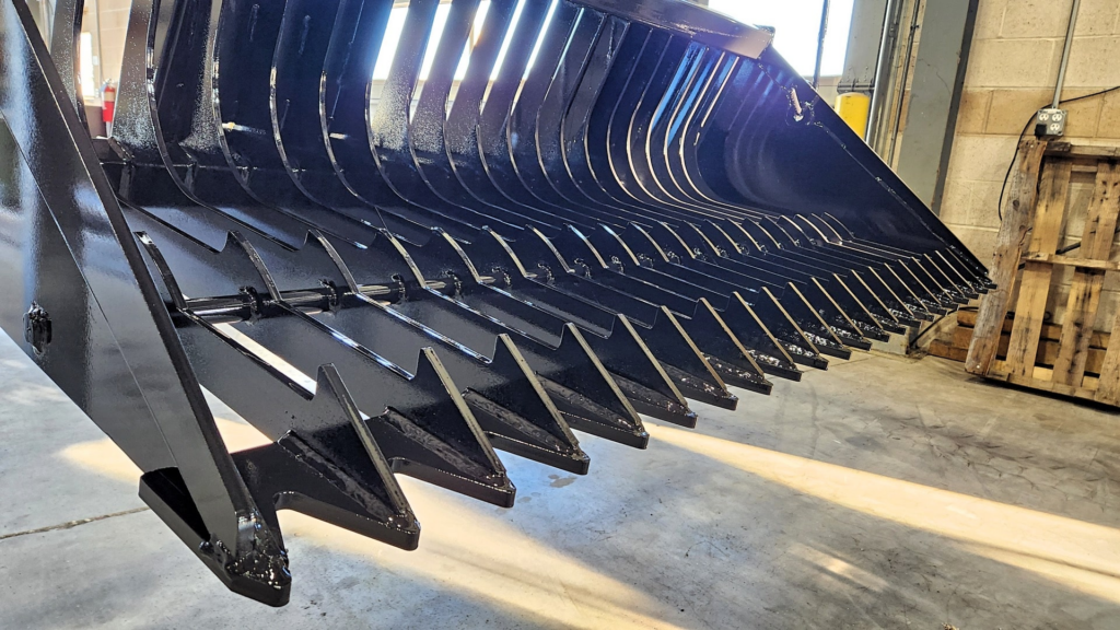 Ideal Rockaway skeleton rock bucket showing pointed gusseted steel tines