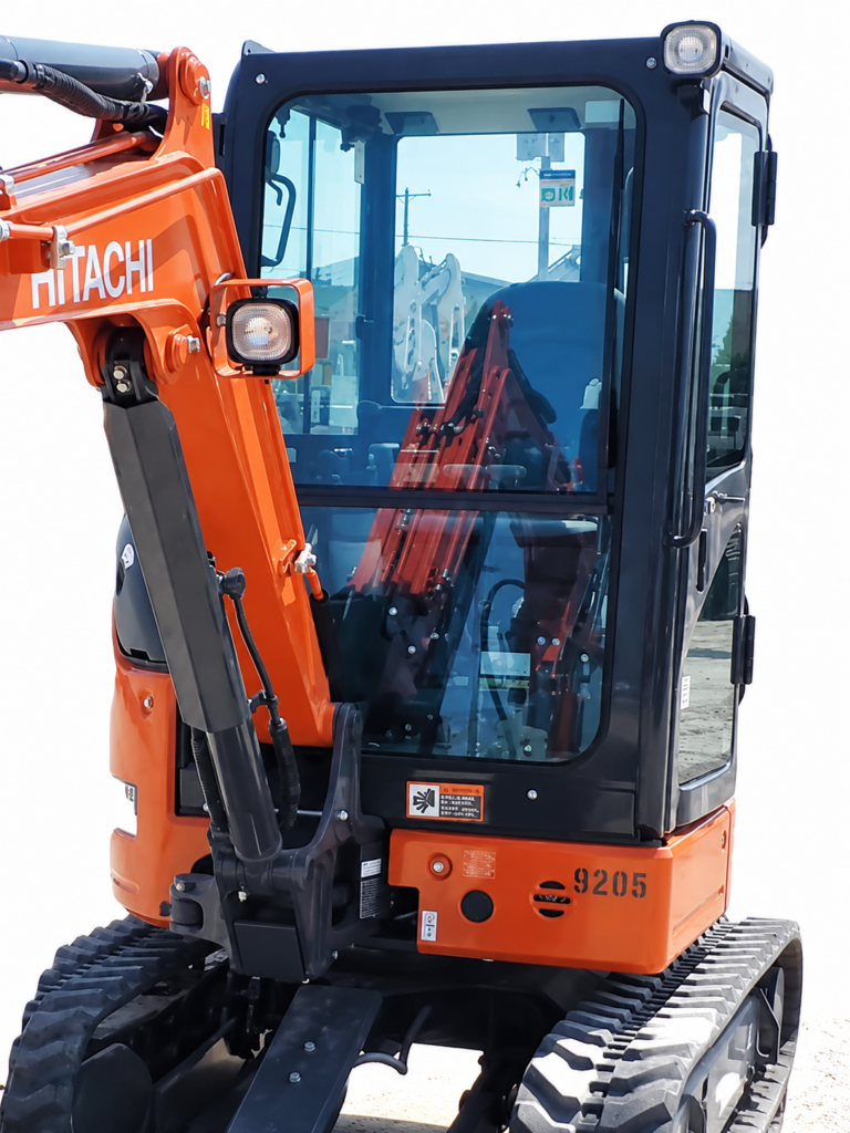 John Deere Compact G Series excavator with upper and lower cab windshield sections installed.