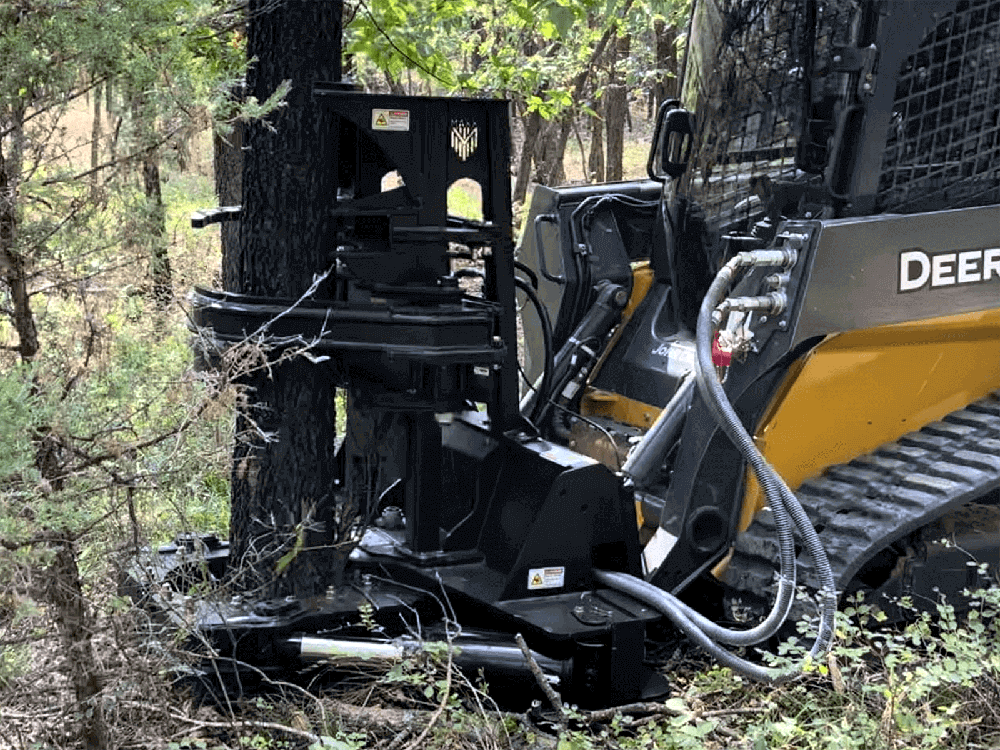 Maxx 16-inch Timberwolf Tree Shear mounted on a compact track loader during forestry clearing