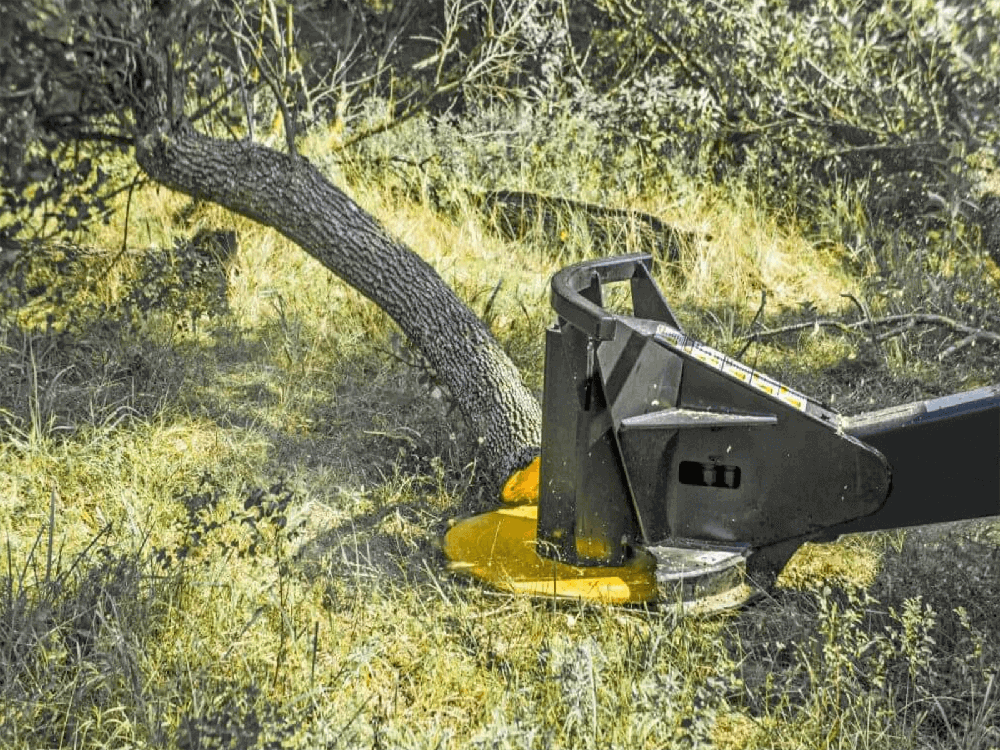 Rear view of the Maxx Attachments XD skid steer tree saw quick attach frame with hydraulic hoses and valve block