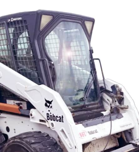 SHIELDS Bobcat G Series polycarbonate windshield installed on a Bobcat skid steer