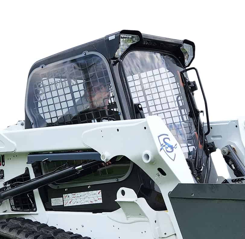 SHIELDS Bobcat M Series polycarbonate side windows installed on a Bobcat skid steer cab