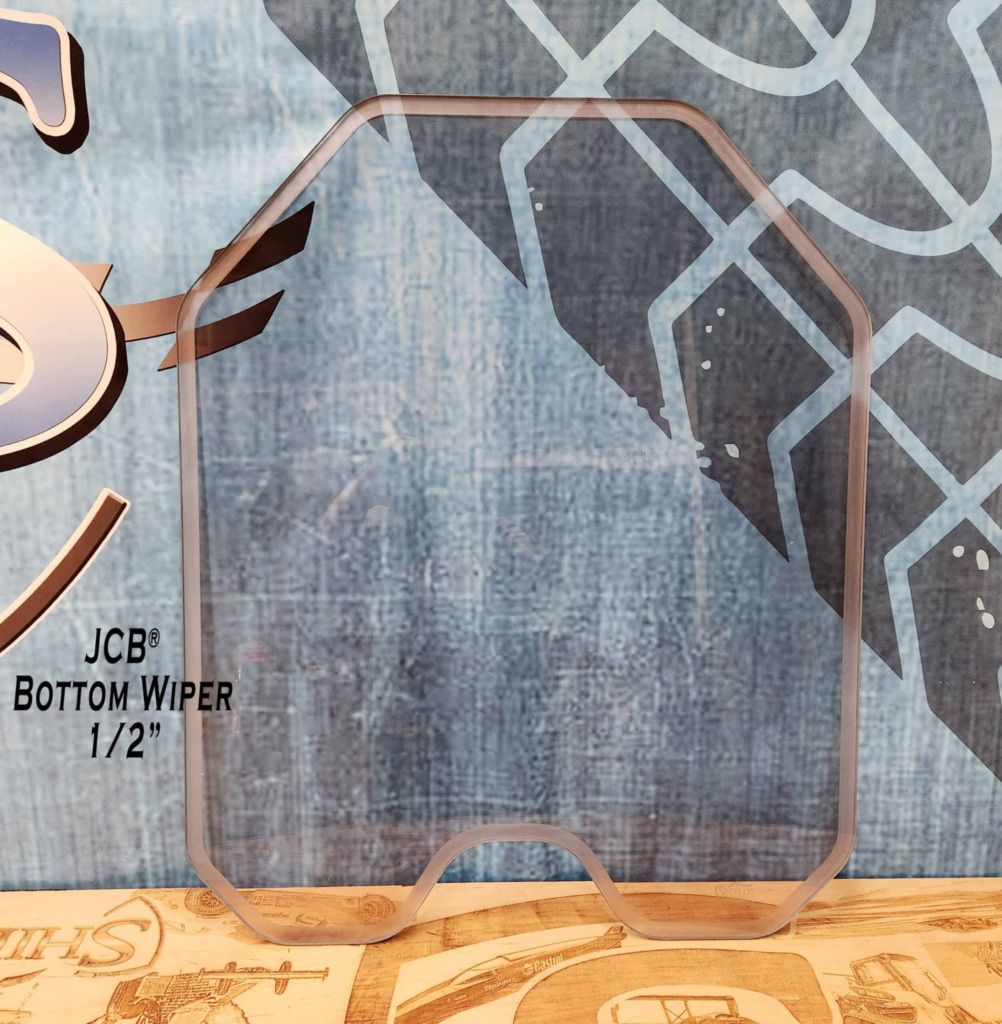 SHIELDS JCB bottom-wiper half-inch polycarbonate skid steer windshield shown from the front