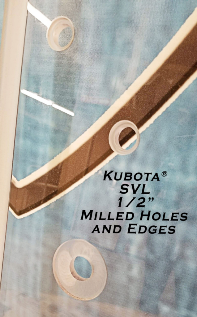 Kubota SVL SHIELDS windshield showing milled holes and edges