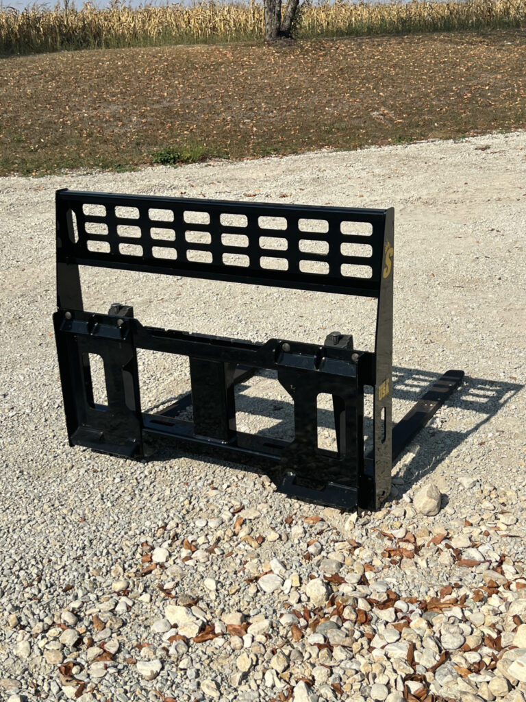 Stinger Attachments CPF Mini Skid Steer Compact Pallet Fork shown from the front angle with see-through rear guard and forks installed