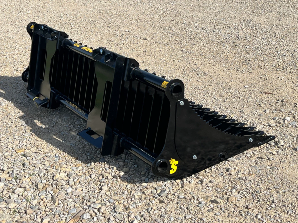 Rear angled view of the Stinger Attachments CRK Mini Skid Steer Compact Rock Bucket showing the mounting frame and open tine construction