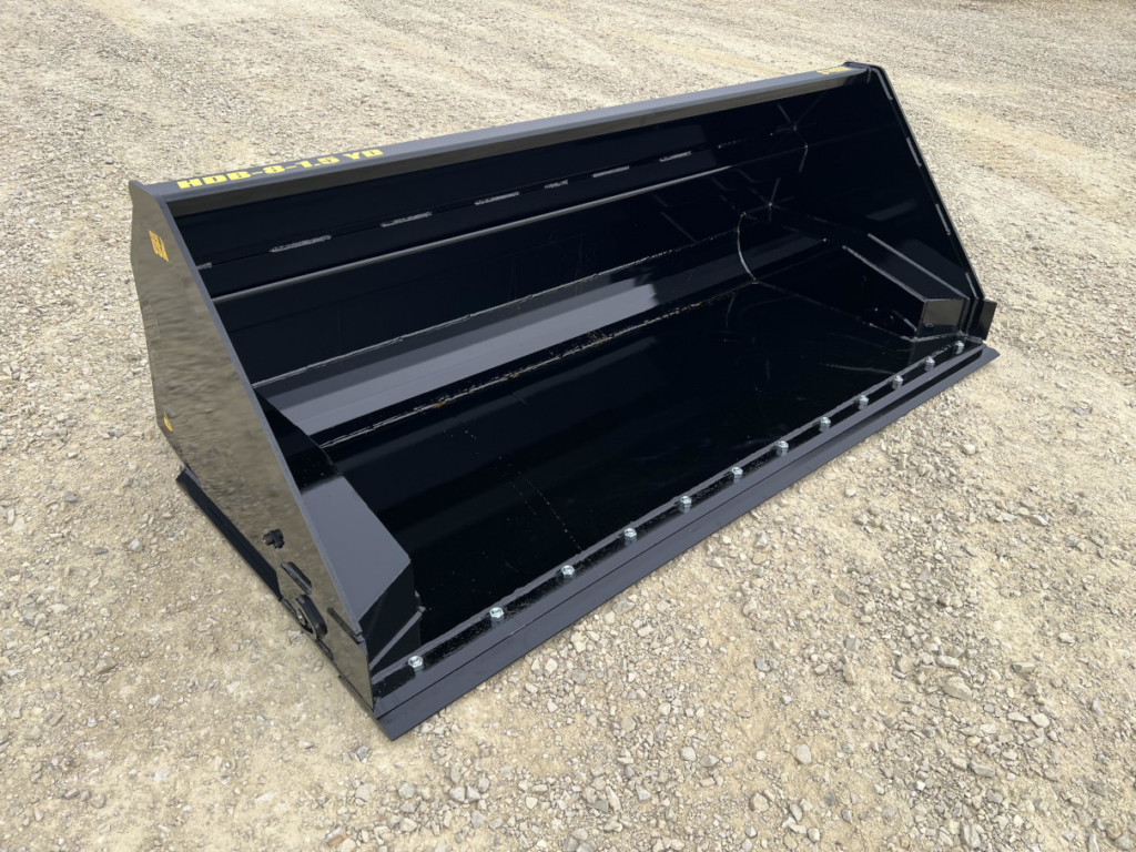 Front angled view of the Stinger HDB Wheel Loader Hydraulic Dump Bucket mounted on a John Deere wheel loader
