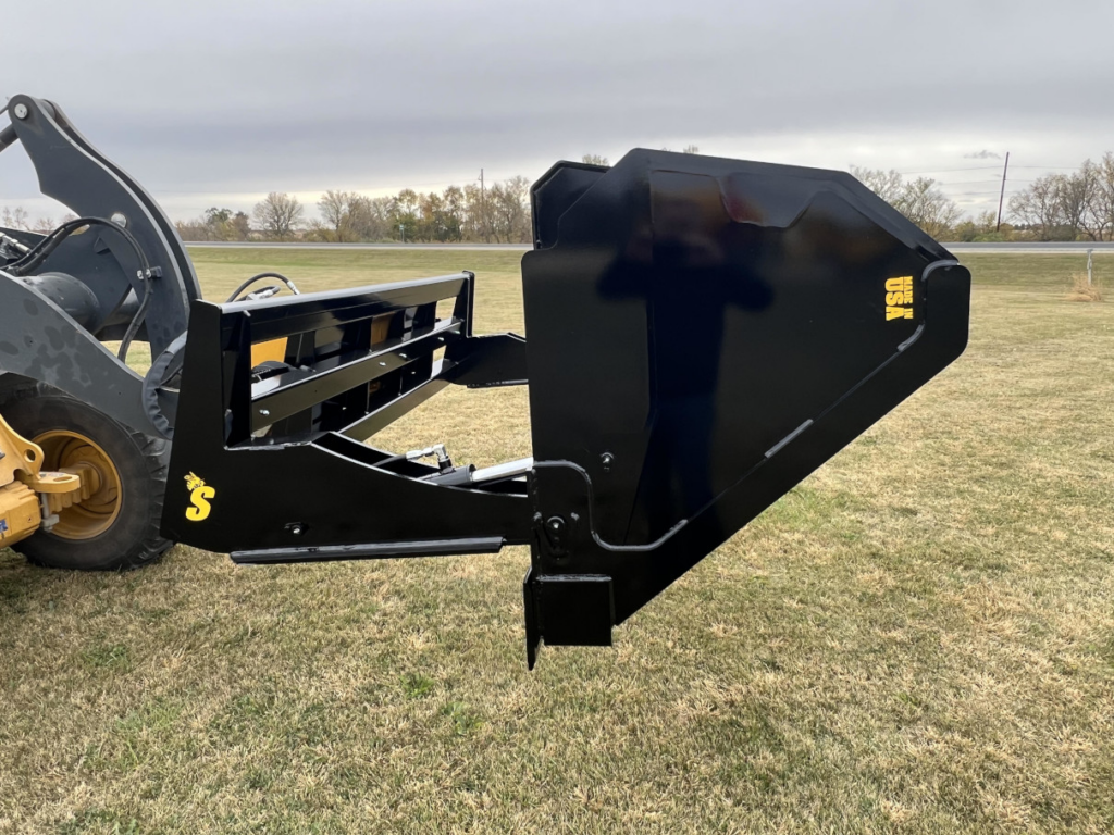 Side profile of the Stinger HDB Wheel Loader Hydraulic Dump Bucket showing the hydraulic dump mechanism and wheel loader mount