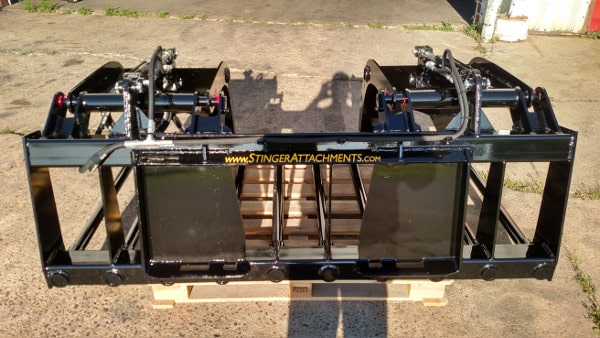 Rear view of Stinger manure tine grapple showing skid steer mounting frame