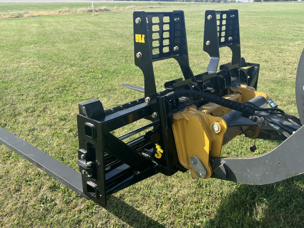 Close-up of Stinger PF3H hydraulic pallet fork carriage, wheel loader mount and dual backrests