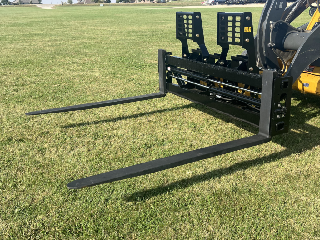 Angled view of Stinger PF3H hydraulic pallet forks showing adjustable forks and heavy-duty carriage