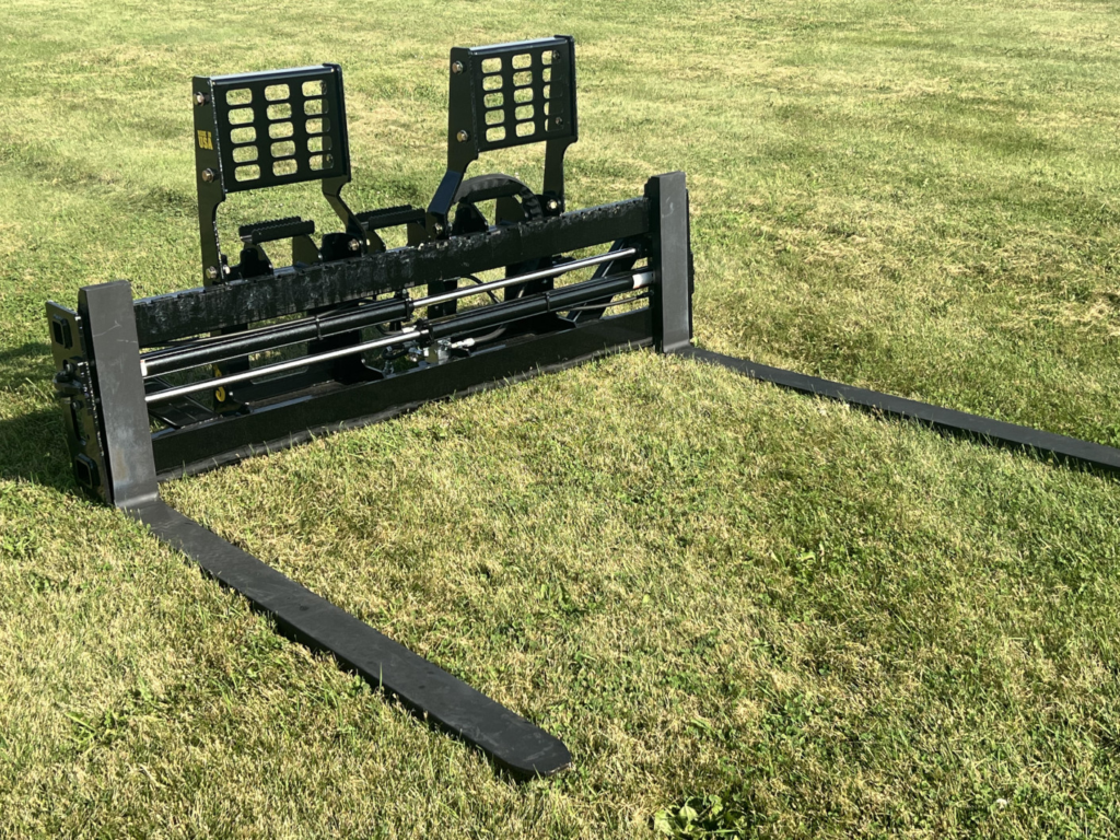 Stinger PF3H hydraulic pallet forks on grass showing long tines, carriage and dual load backrests