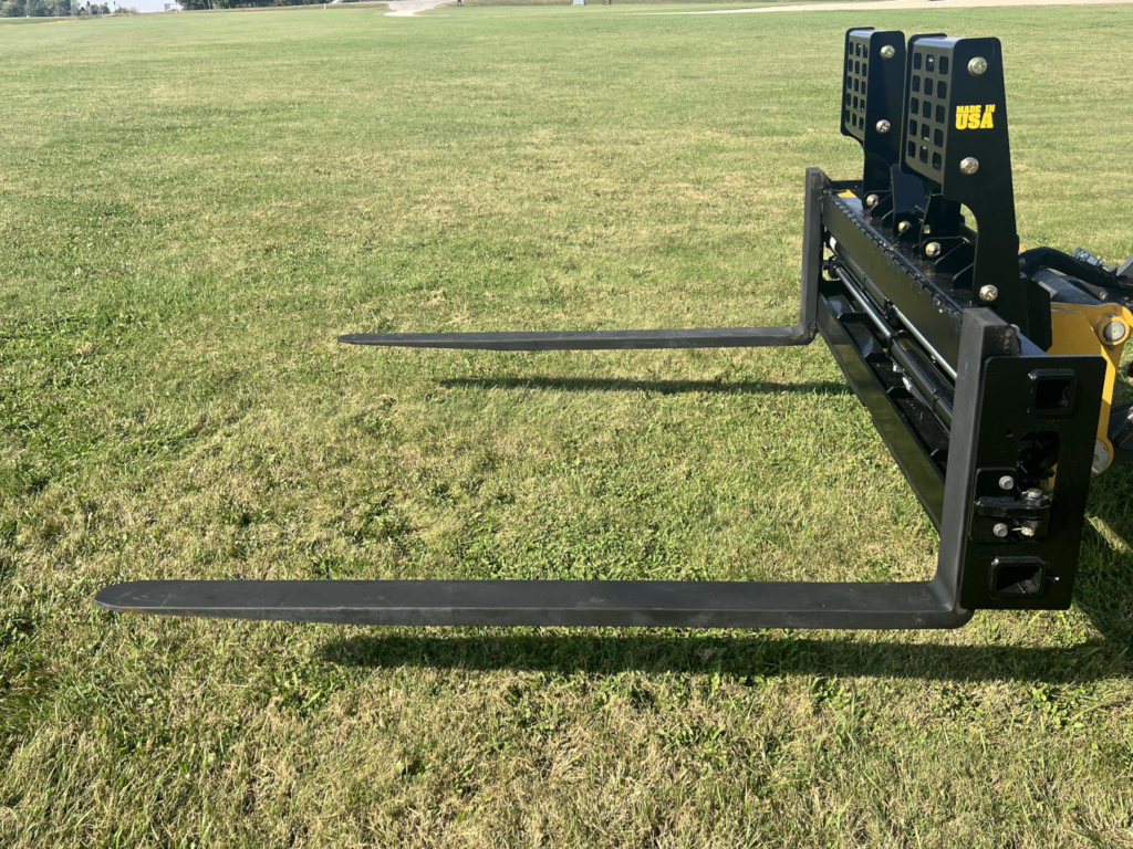 Side view of Stinger PF3H hydraulic pallet forks showing long heavy-duty tines and fork carriage