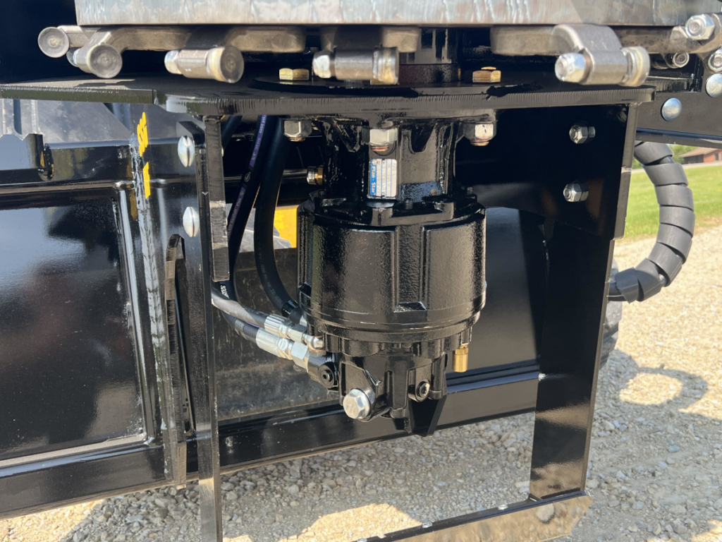 Close-up of the radial piston motor on the Stinger skid steer stump grinder