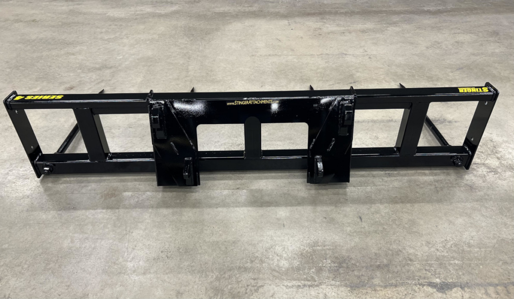 Rear view of the Stinger Wheel Loader Double Round Bale Spear showing the wheel loader mounting structure and reinforced frame