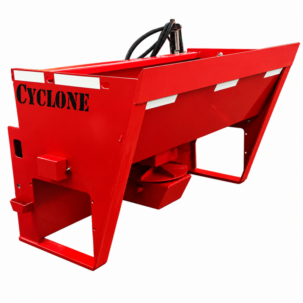 Front right angled view of the Stout Cyclone skid steer material spreader showing the auger, hopper interior, and hydraulic hose routing