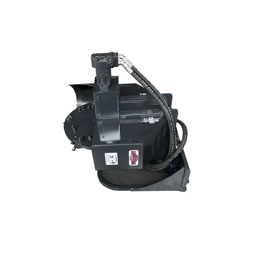 Left side view of the Stout mini skid steer stump grinder showing the hydraulic motor, hoses, cutting wheel housing, and protective mesh