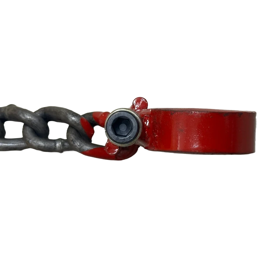 Close-up of the Stout TrackClaws traction chain and tension clamp assembly