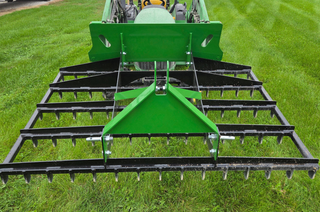 SWAT Metal Works 72" Compact Land Rake showing the 3-point hitch configuration for compact tractors.