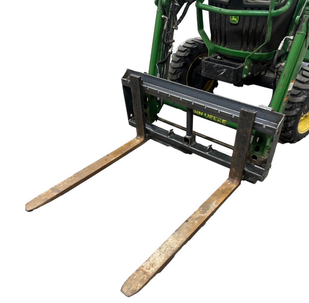Black SWAT Metal Works Light Duty Pallet Forks with 42-inch forks mounted on a John Deere compact tractor.